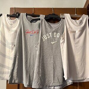 4 Nike tank tops